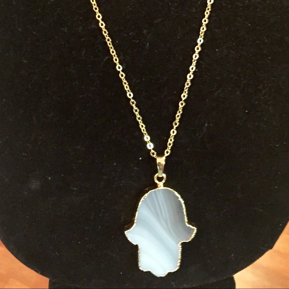 Long gold and pearl color hamsa necklace